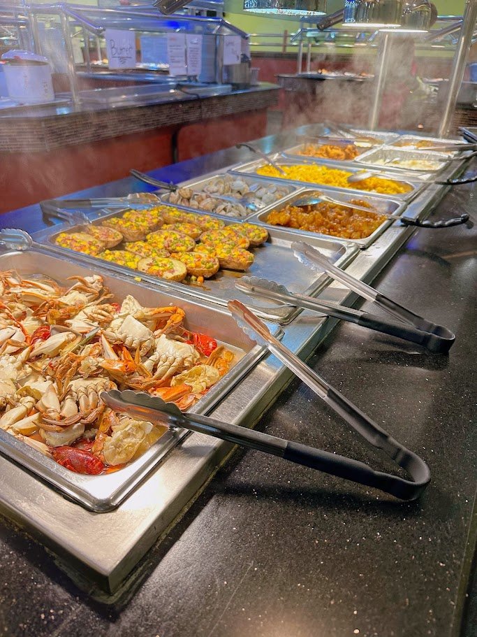 Dining room tables beside the buffet line.